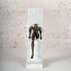 Abstract Breakthrough Figurine – Modern Resin Sculpture Emerging from Stone Block