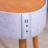 Round wooden stool with a gray upholstered seat and control panel.