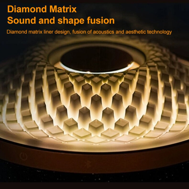 Ceiling light fixture with diamond matrix design on a dark background