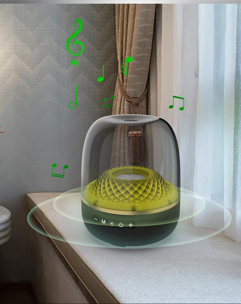 Decorative lamp with geometric design on a glass base in a room setting