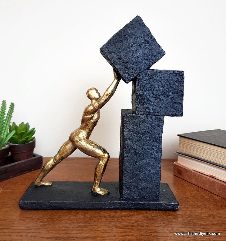 Man Arranging Blocks Decorative Polyresin Showpiece