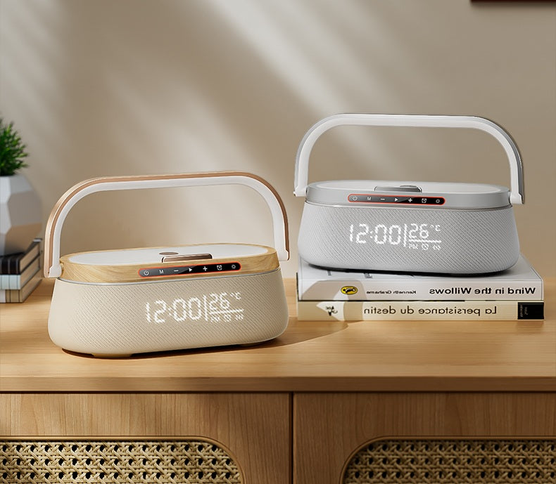 Two white electronic devices with digital displays on a wooden surface.